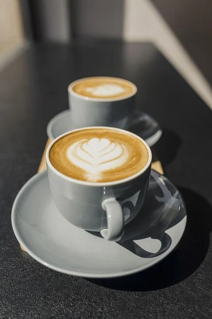 Cappuccino with cinnamon powder on top